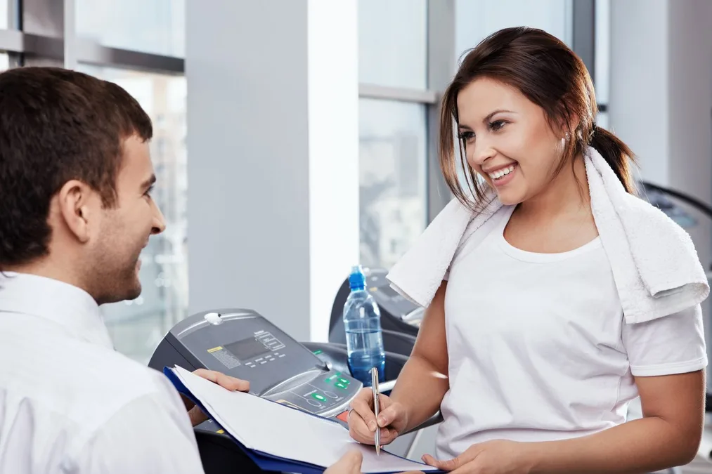 Patient reviewing a metabolic health plan with a clinician at Ideal Wellness in Baltimore